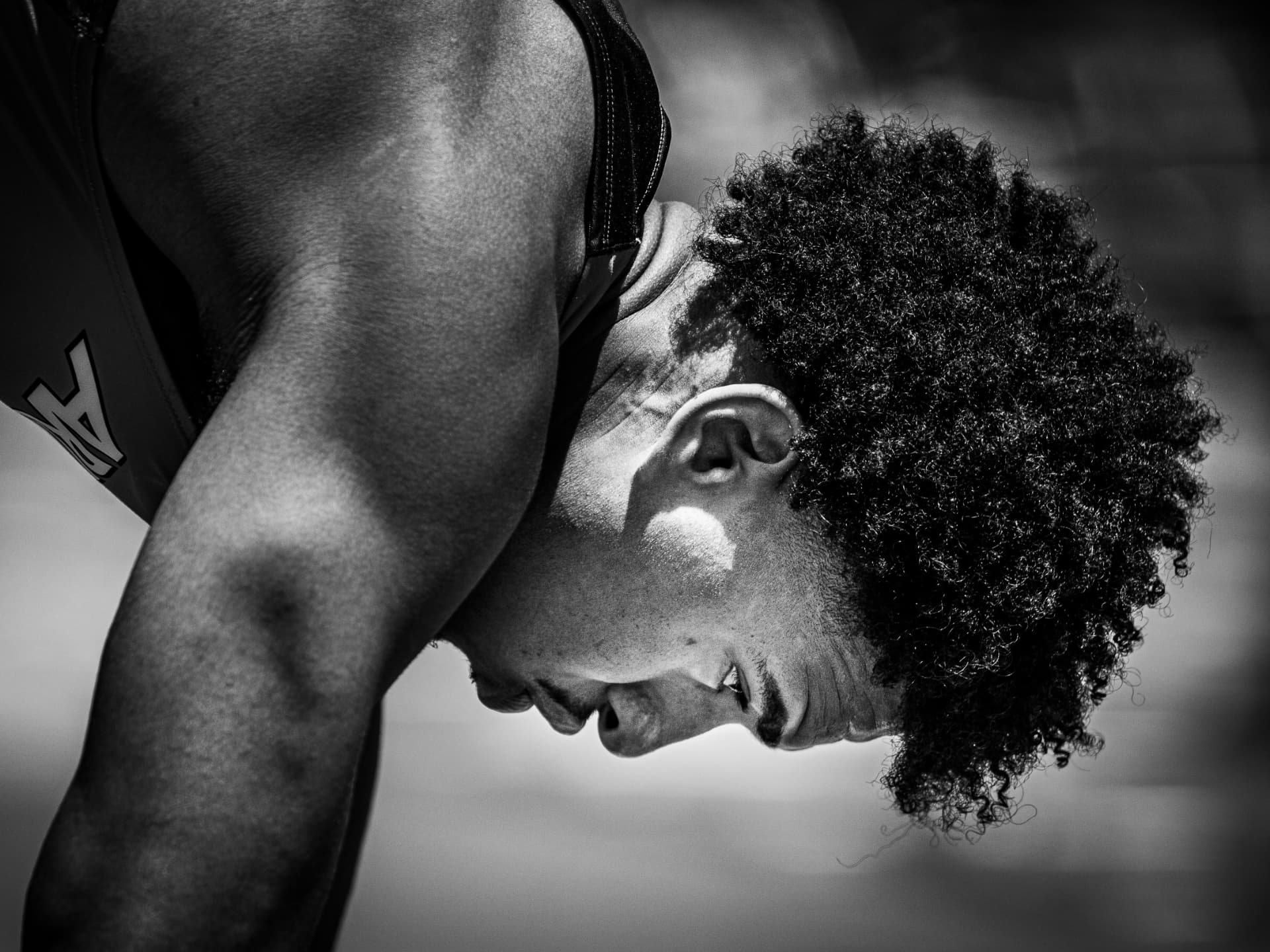 Athlete in focus before competition, black and white portrait